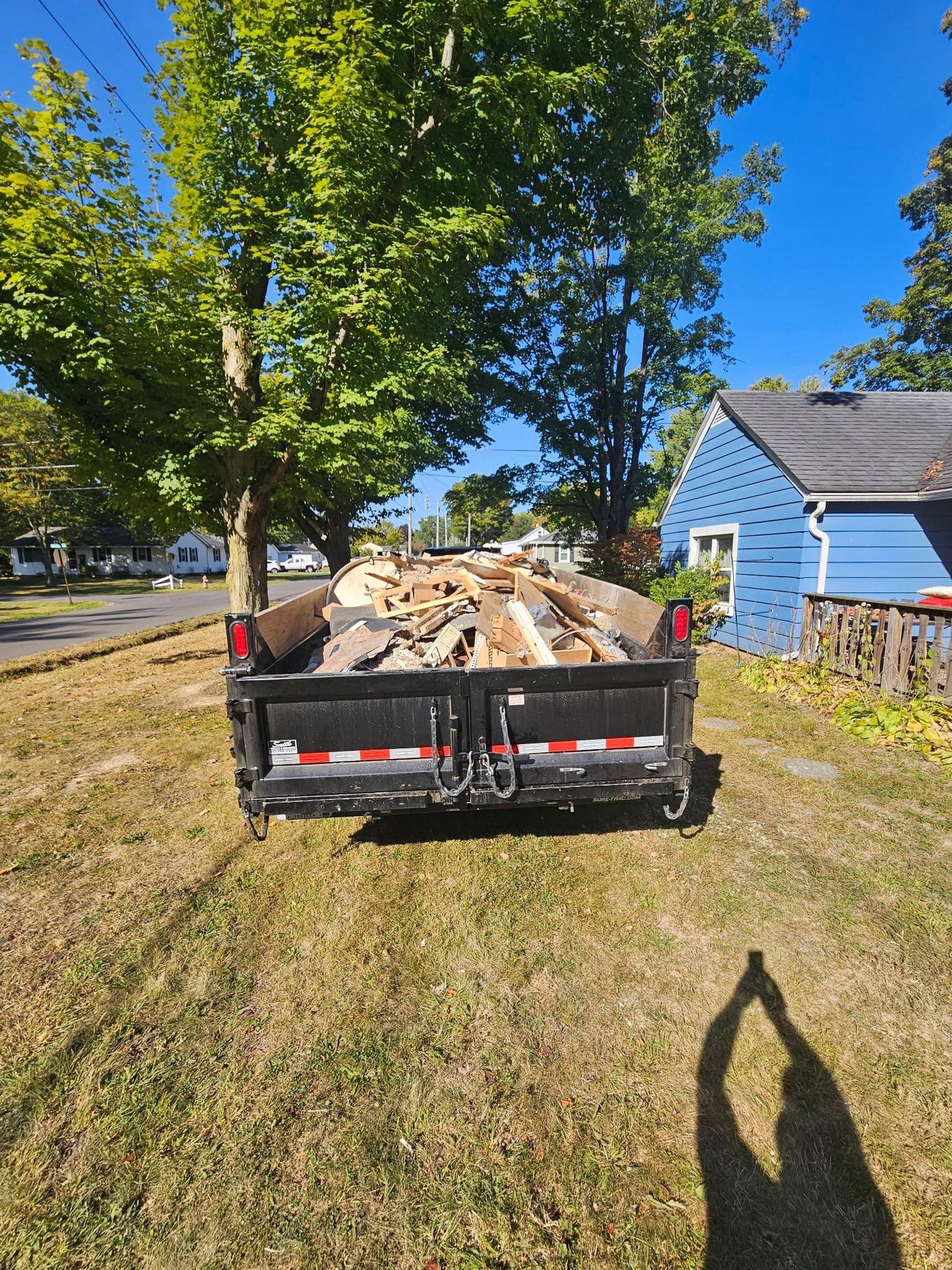 Dump trailer loaded with construction debris